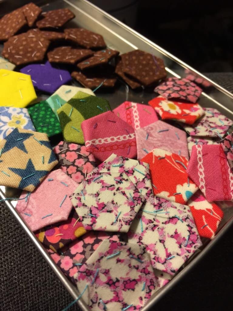 tiny hexagons in a tin