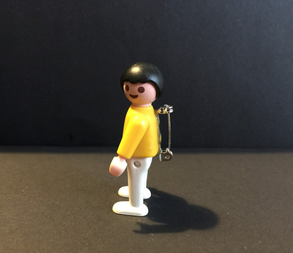 vintage Playmobil figure badge
