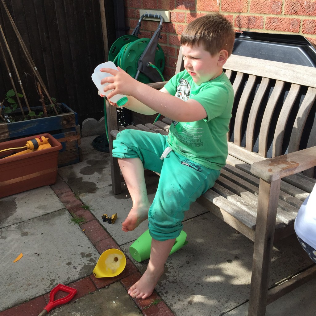 recycled milk bottle watering can