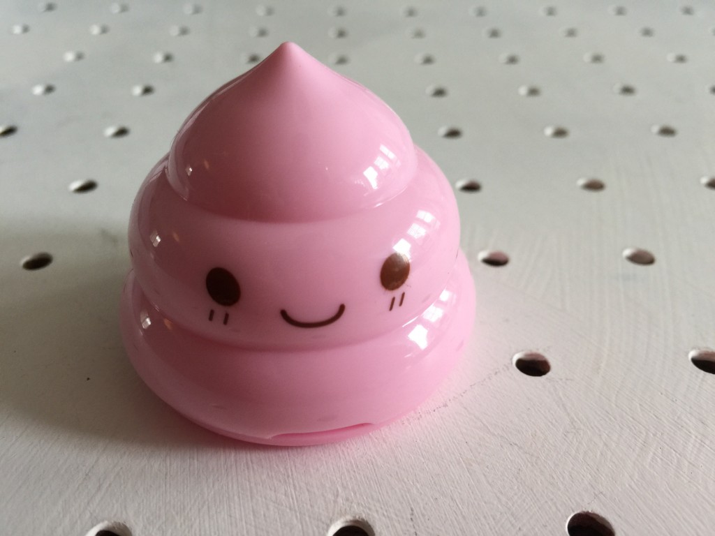 smiling poo sharpener