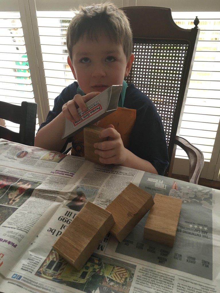 sanding wooden blocks