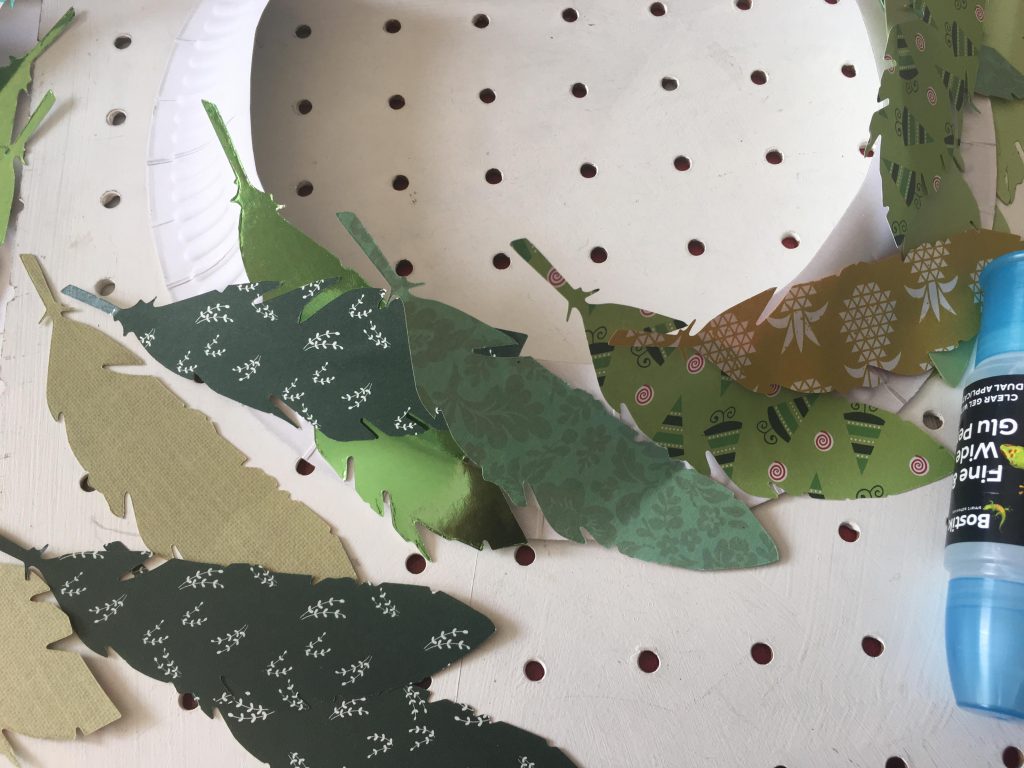 Paper plate laurel wreath craft for kids