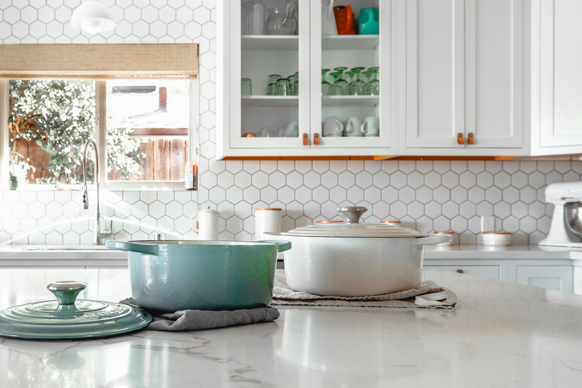 two cooking pots on kitchen island